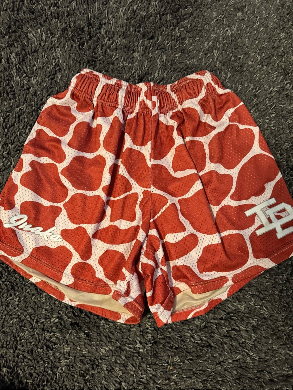 Inaka Mesh Shorts Red Giraffe-Print Athletic Shorts